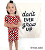 {Black} Don't Ever Grow Up Banner