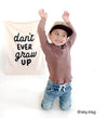 {Black} Don't Ever Grow Up Banner