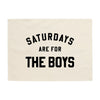 Textile with 'Saturdays are for the Boys' text on a beige background